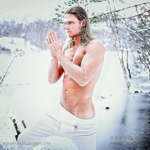 Swedish male model posing in snow