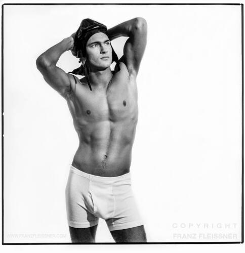 handsome-young-man-in-underwear-posing-in-studio-by-Franz-Fleissner